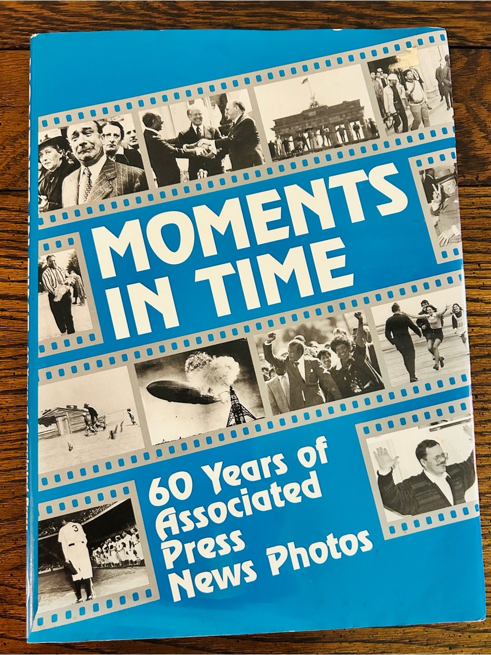 Moments in Time — Blue Photo Book of News Photography